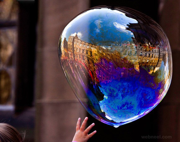 http://webneel.com/daily/sites/default/files/images/daily/07-2013/23-water-bubble-reflection-photography.jpg