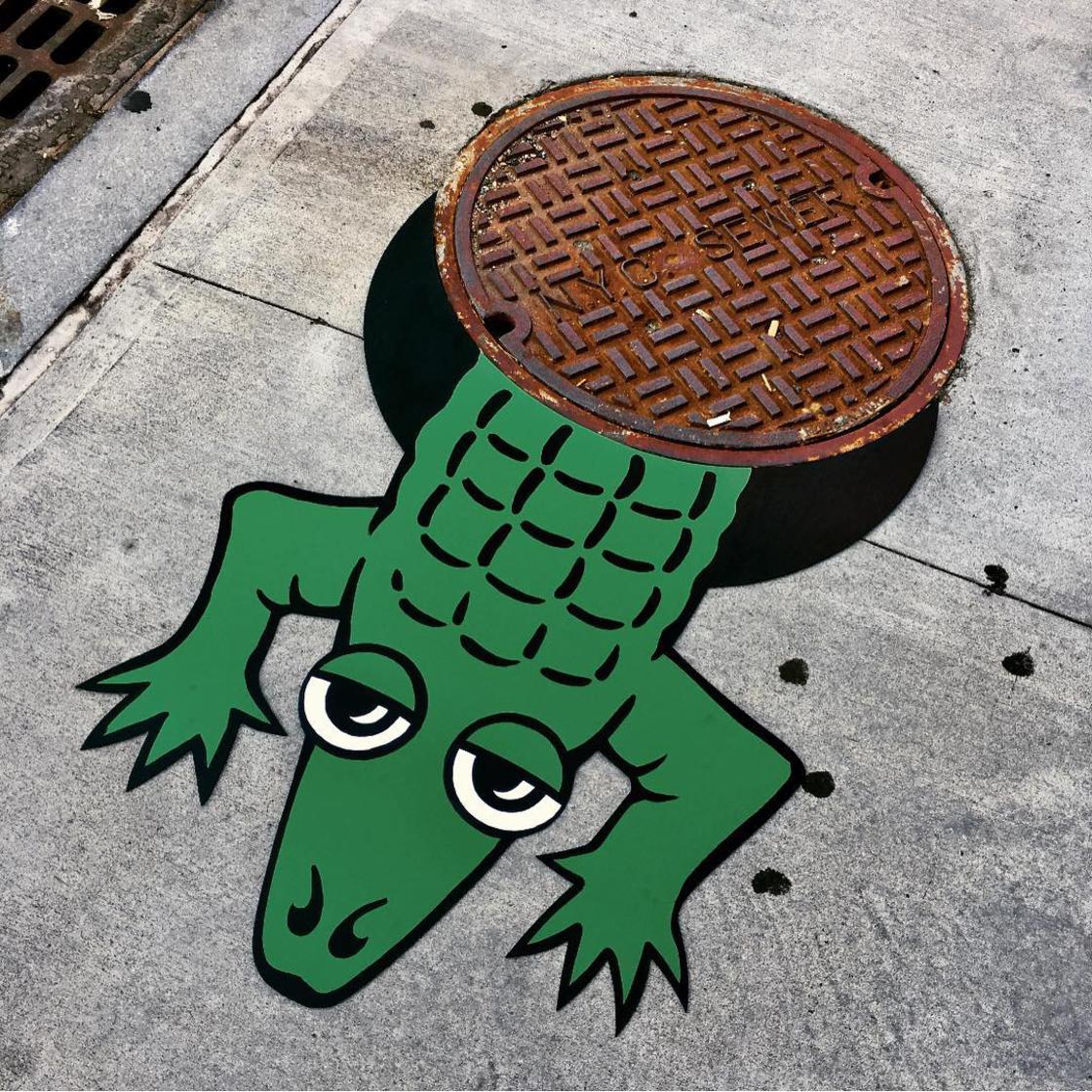 street art works crocodile by tom bob
