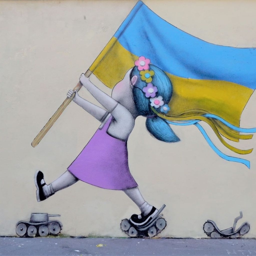 street art painting we support ukraine by seth globe painter