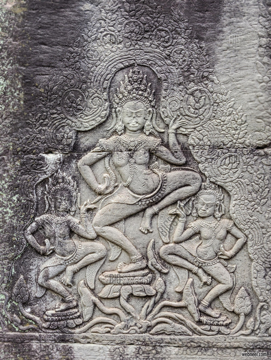 bas relief low woman sculpture angkor wat cambodia