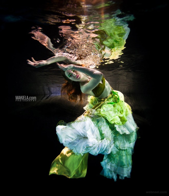night underwater photography by rafal makiela