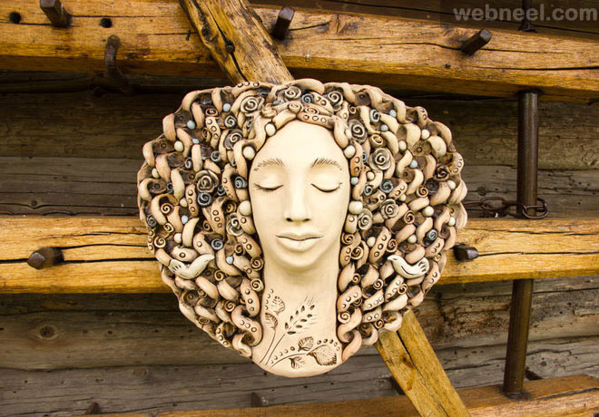 ceramic girl wall sculpture