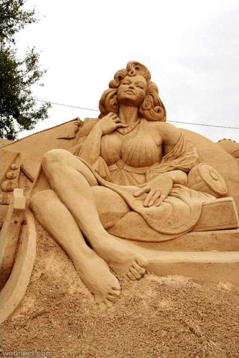 woman sand sculpture