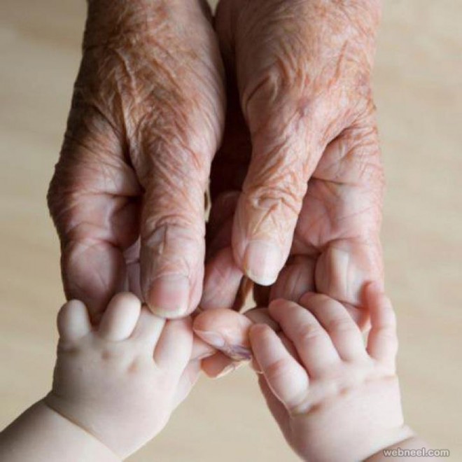 hands baby grandma