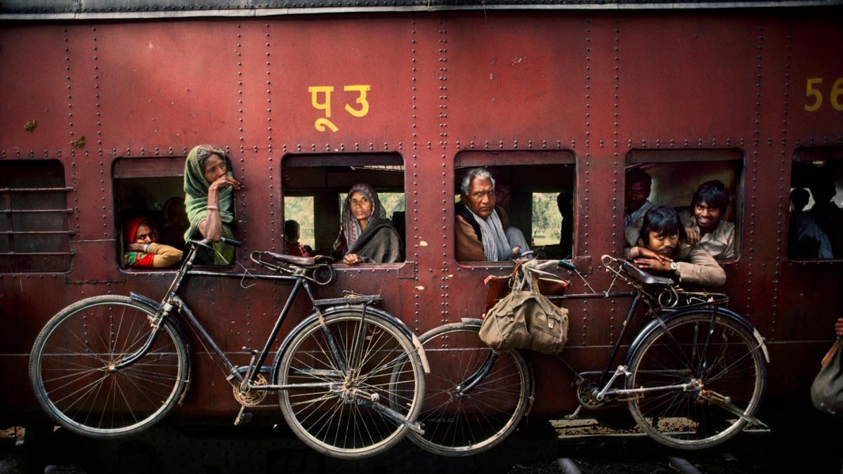 3 cycles indian railways photography by steve mccurry photo