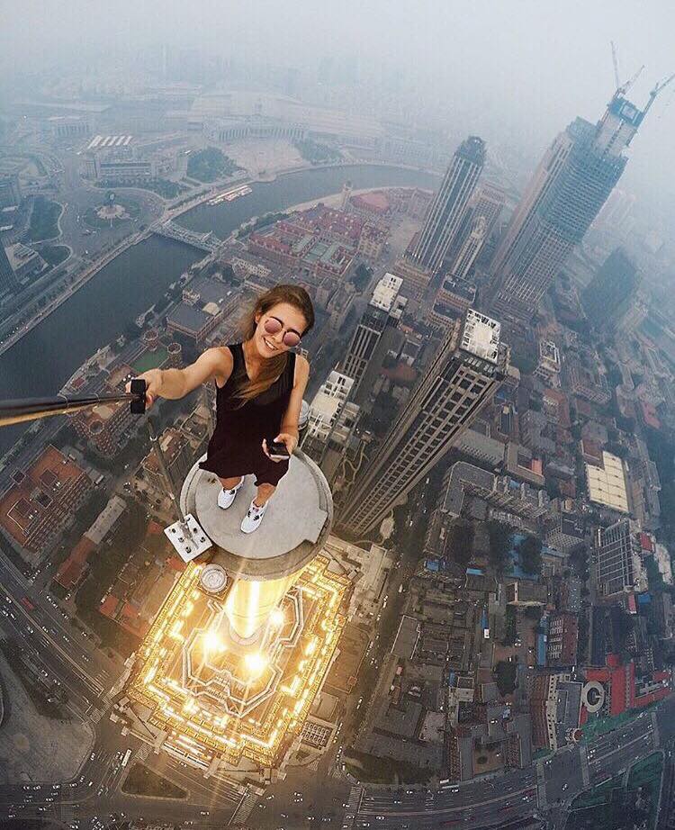 selfie photography from world tallest building by angela nikolau