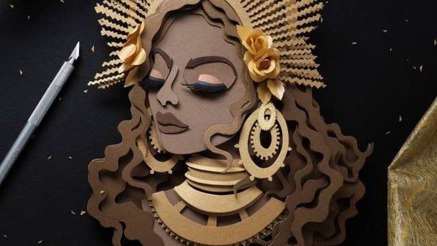 2 paper cut sculptures by john