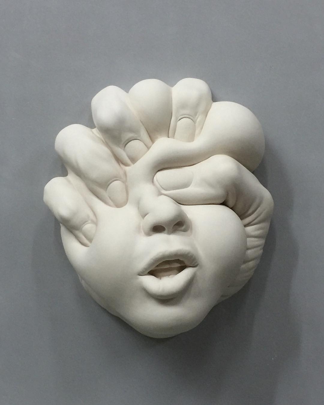 1 ceramic sculpture byjohnson tsang