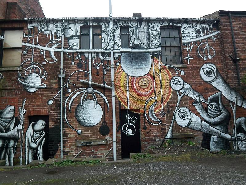 11 surreal mural art by phlegm